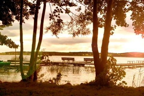 Bench at the lake Stock Photos