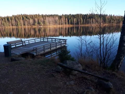 A bench by the lake Stock Photos