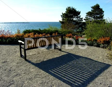 Bench on Lake shore Stock Photos