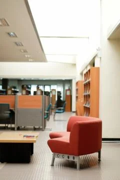 Bench in library Stock Photos