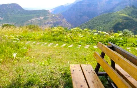 Bench in the mountains Stock Photos