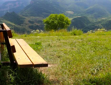 Bench in the mountains Stock Photos