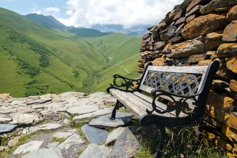 Bench in the mountains Stock Photos