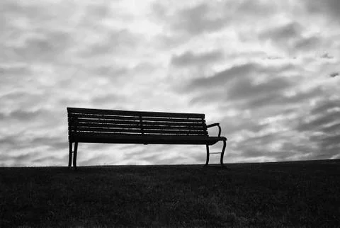 Bench With Ominous Sky Stock Photos