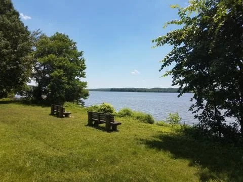 Bench overlooking the Potomac river Stock Photos