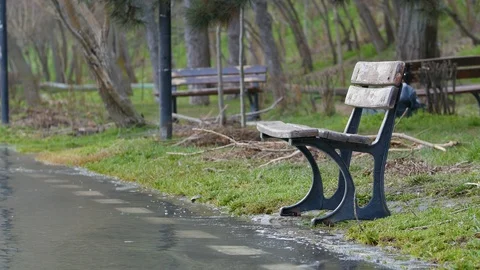 Bench In A Park After A Flood Stock Footage 88414016