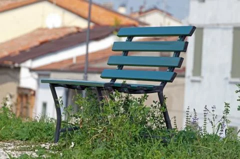 Bench in a Park on the lawn Stock Photos