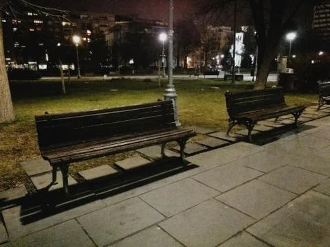 Bench in the park at night Stock Photos