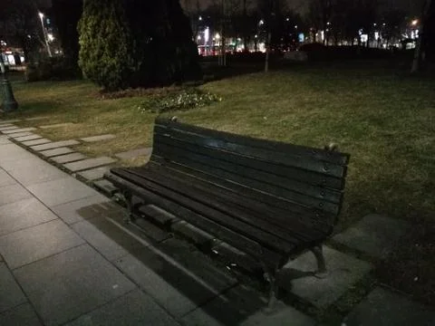 Bench in the park at night Stock Photos