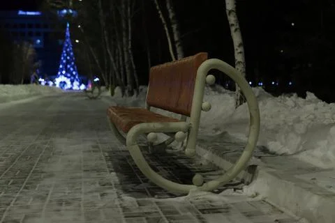 A bench in the park Stock Photos