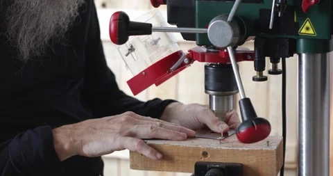 Bench pillar, worker drilling hole Stock Footage 188697268