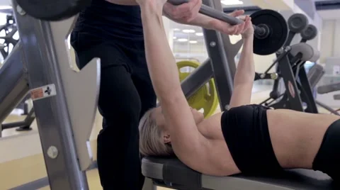 Bench press using a barbell Stock Footage 48928340