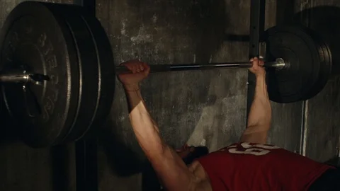 Bench pressing in a gym. Video stock 92958106