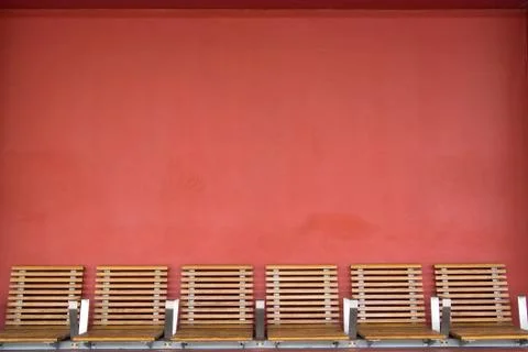 Bench on red background Stock Photos