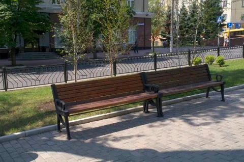 Bench for rest in park. Stock Photos