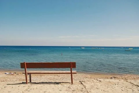 Bench by the sea Stock Photos