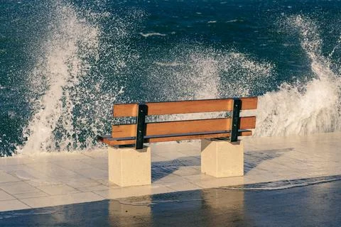 Bench by the sea Stock Photos
