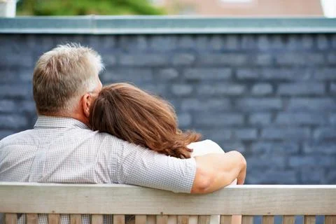 Bench, senior couple and relax in outdoor park for love, commitment or bonding Stock Photos