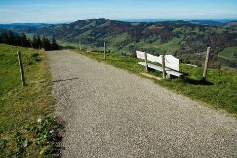 Bench on the side of the street Stock Photos
