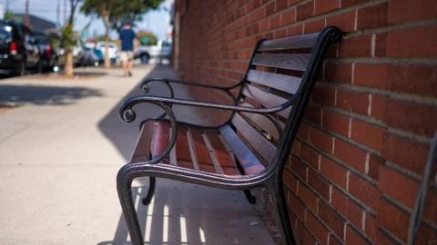 Bench on Sidewalk Stock Photos