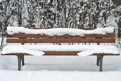 Bench in the snow Stock Photos