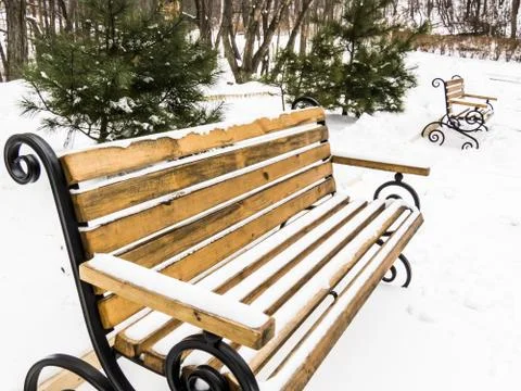 Bench in snow Stock Photos