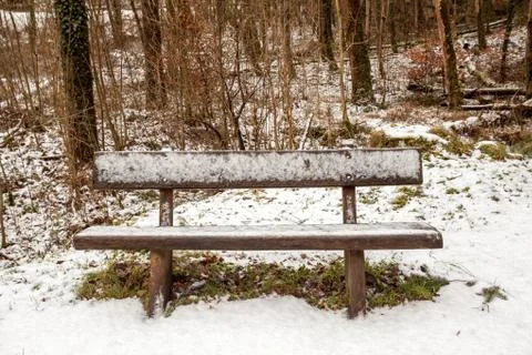 An Bench in snow Stock Photos