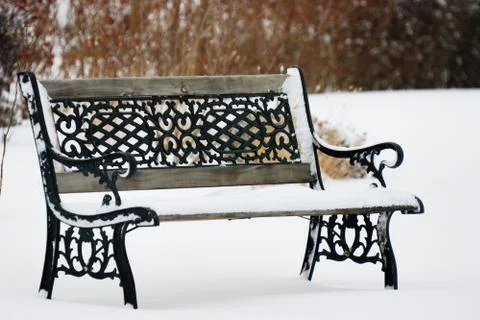 A bench in the snow Stock Photos