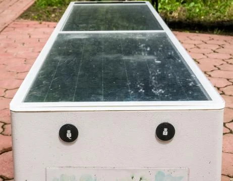 Bench with solar panel and mobile phone charger in Bucharest. Foto stock