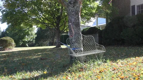 Bench with string blowing in the wind Video stock 32141047