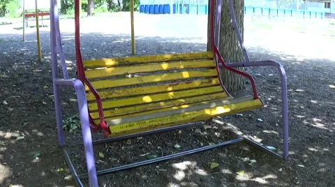Bench Swing swaying in a park Video stock 53842724