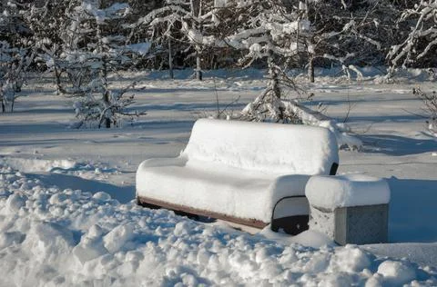 Bench under the snow Stock Photos