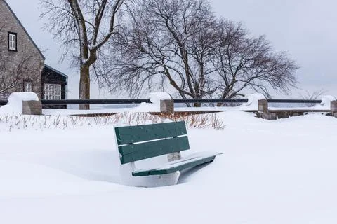 A bench under the snow Stock Photos