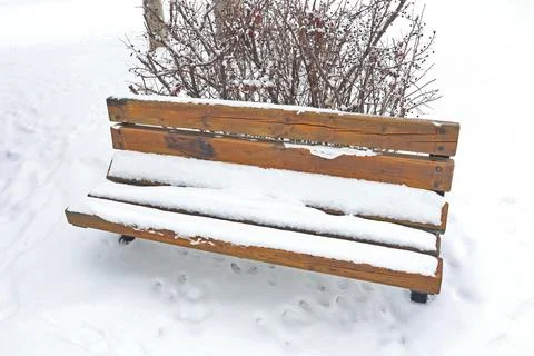 A bench under the snow Stock Photos