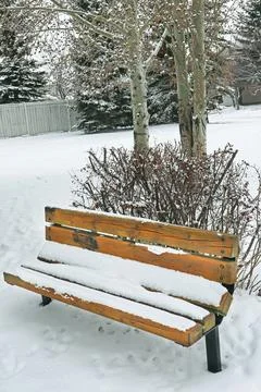A bench under the snow Stock Photos