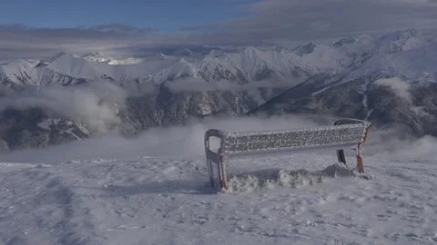 Bench with a view of the Alpine mountain range Video stock 82639209