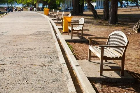 Benches along the path. Stock Photos