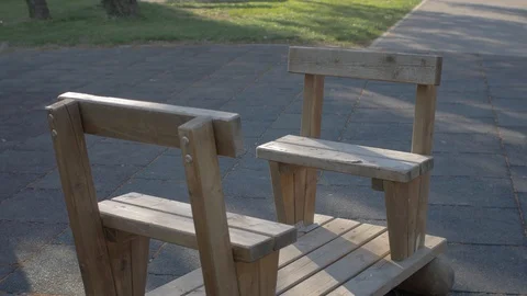 Benches at outdoor empty playground closed due to Covid-19 Corona virus. Stock Footage 128933383