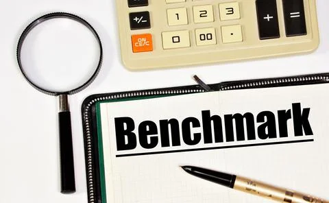 Benchmark. A text label in the research notebook. Stock Photos