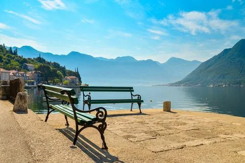 Benchs on promenade of Perast Stock Photos