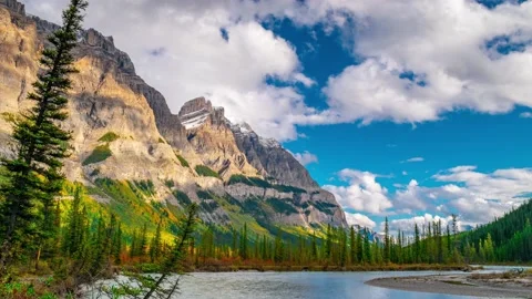 Bend River With Stark Rock Face in Banff Time Lapse 4K Stock Footage 134641553