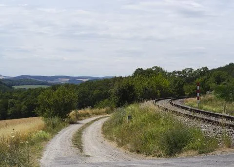 Bend road and rail direction with a beautiful view Stock Photos