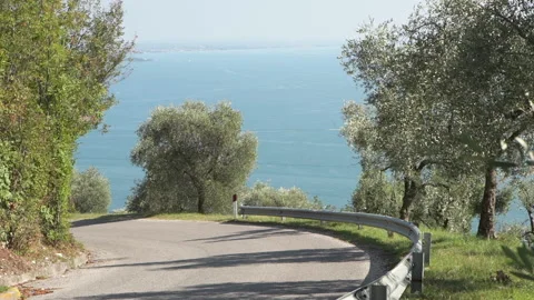 Bend on the road in The mountains at Garda Lake   Video stock 133336680