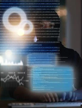 Bending data to his will. Shot of a hacker cracking a computer code in the da Stockfoto's