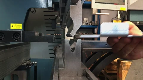 Bending of galvanized sheet metal with a press machine at the factory Stock Footage 167143167