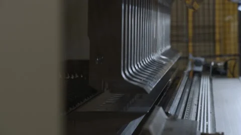 Bending machine. Bends sheets of metal Stock Footage 131734649