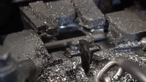 Bending machine for steel chains during the wasching phases Stockbeeldmateriaal 101374454