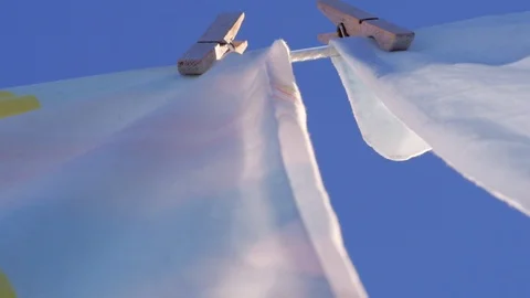 Beneath the Laundry Line Slow Motion Stock Footage 97868293