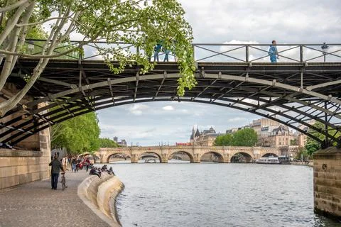 Beneath the pcturesque Pont des Arts in Paris Stock Photos