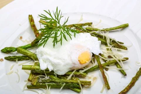 Benedict egg with asparagus Stock Photos